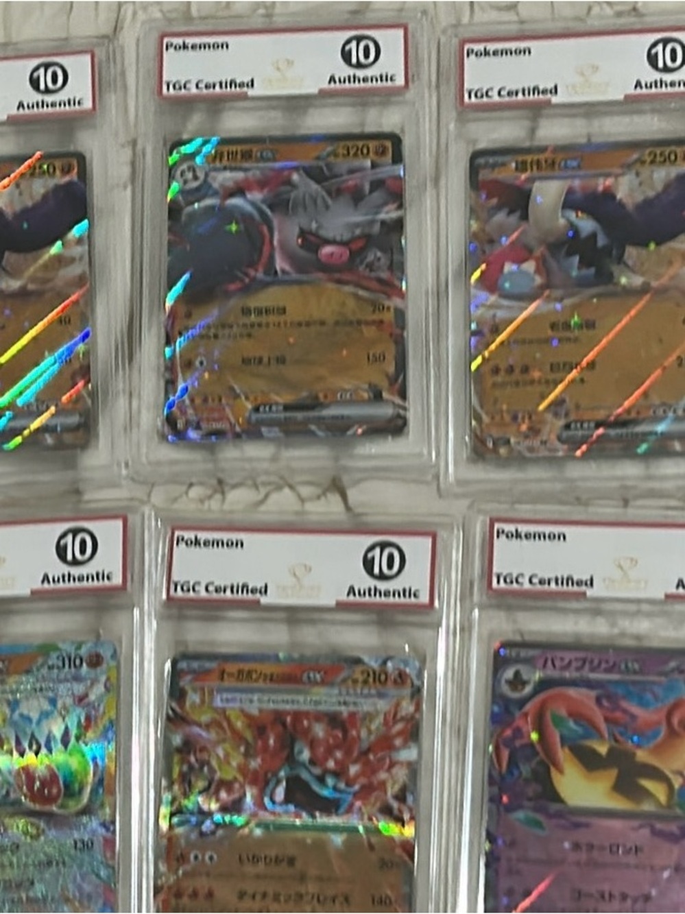 Pokemon Holographic Trading Card Lot with Gold and Rainbow Foil Accents